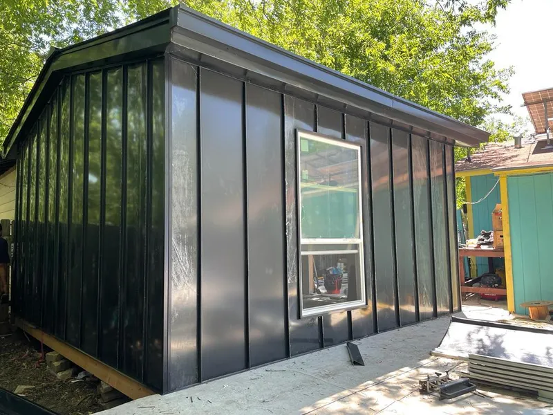 Black standing seam metal wall panels for Metal Roof Installation in Hallandale Beach